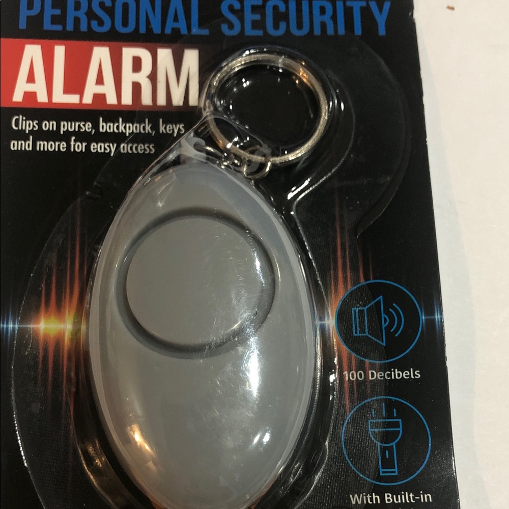 Grey Personal Security 100 decibels clip on alarm with builtin flashlight new